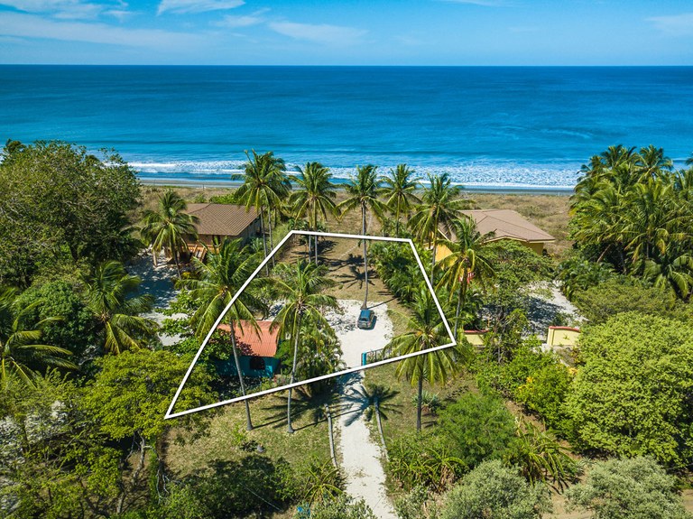 Titled Beachfront Lot with Guest House
