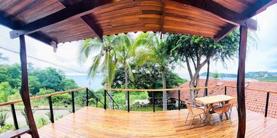 Beautiful Front View of Flamingo Beach Ocean View 1 Bedroom Rental Property