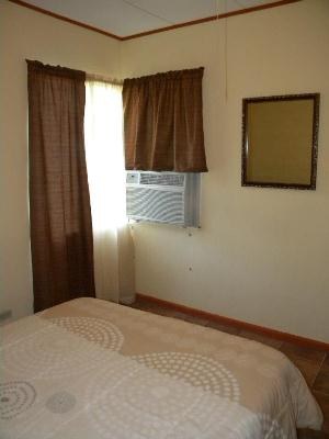 Bedroom of This Close to The Beach  Budget Friendly Apartment
