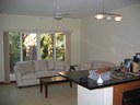 Open Kitchen and Living Area of This Charming Ocean Vicinity Condo