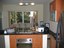 Open Kitchen of This Charming Ocean Vicinity Condo