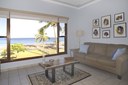 Living Area and View of this Beachfront Ocean View Sunset Condo