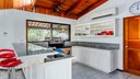 Kitchen of Luxury Cliffside Ocean Access Villa in Flamingo