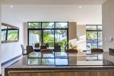 Dining area with view to the pool at luxury community in Uvita, Costa Rica, townhouses for sale