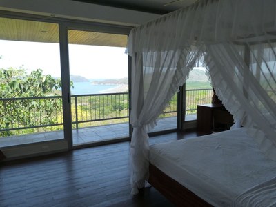 Bedroom with ocean view - House for sale with ocean view in Paquera Costa Rica, luxury community close to the sea
