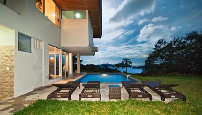 Pool seating area  - House for sale with ocean view in Paquera Costa Rica, luxury community close to the sea