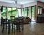 Living room with a beautiful view of the Garden- luxury condo in Manuel Antonio for sale-a perfect place to live with your family