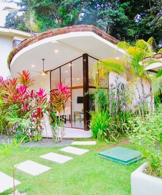Outside view-Luxury Villa in Manuel Antonio for sale- surrounded by beautiful gardens