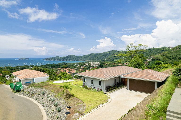 Pacifico Glass Wall Villa: New Construction 3 Bedroom with Ocean View in Pacifico Gated Community