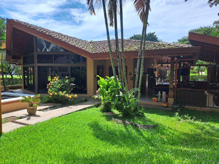 Casa Garcia: Casa Garcia is a Tranquil 1.25 Acre Retreat with 3 Structures and a thriving Commercial Business within the Heart of Playa Carrillo 
