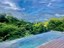 Casa en venta en exclusiva comunidad cerca al mar en Costa Rica  –  piscina infinita con espectacular vista